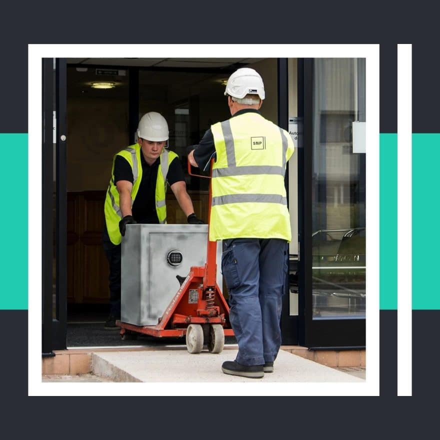 Image of people removing and disposing old safes